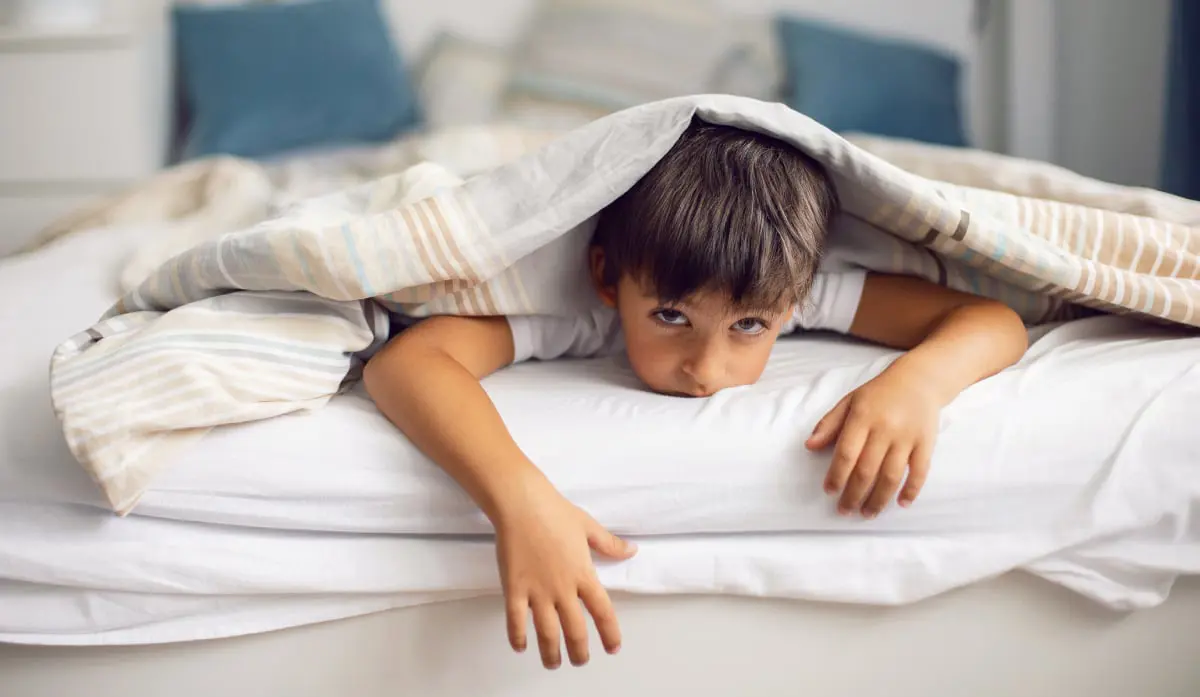 كيف تساعدين طفلك على النوم باكراً؟