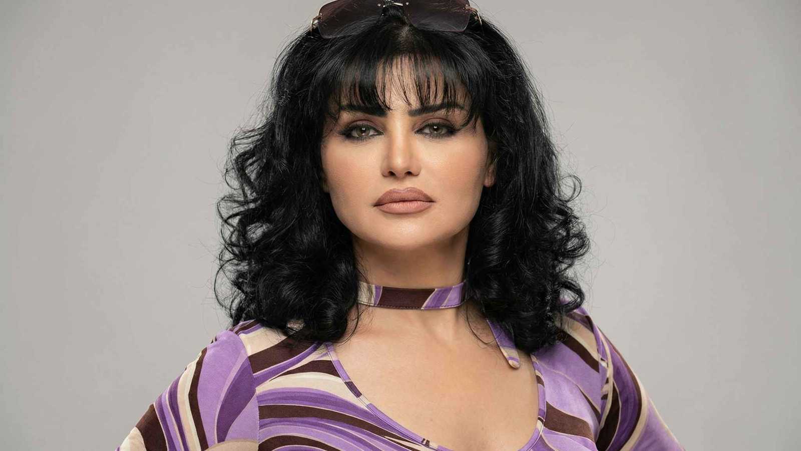 حقيقة صورة نورمان أسعد وابنتها جودي أيمن زيدان 