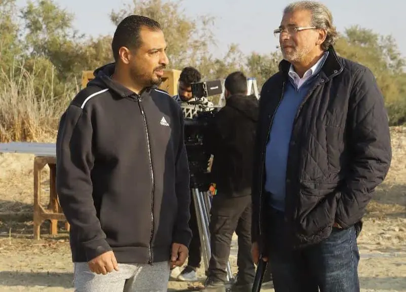 تامر فتحي مع المخرج خالد يوسف في أحد الأعمال الدرامية