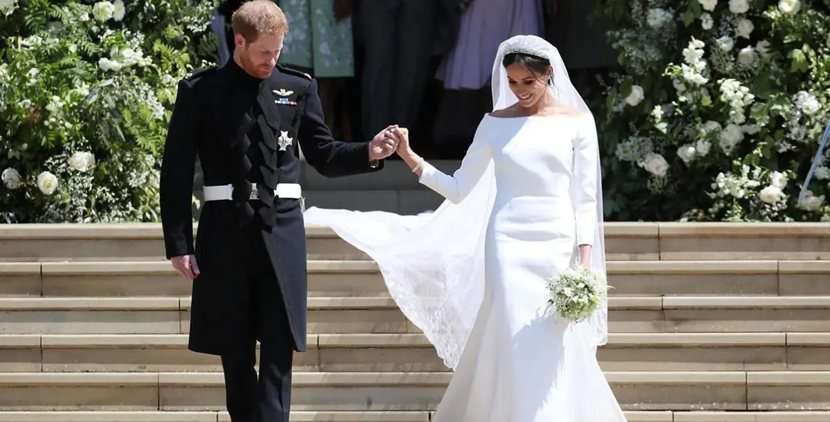 زوجة الأمير هاري.. عروس بدون مكياج وبفستان خالٍ من التفاصيل!
