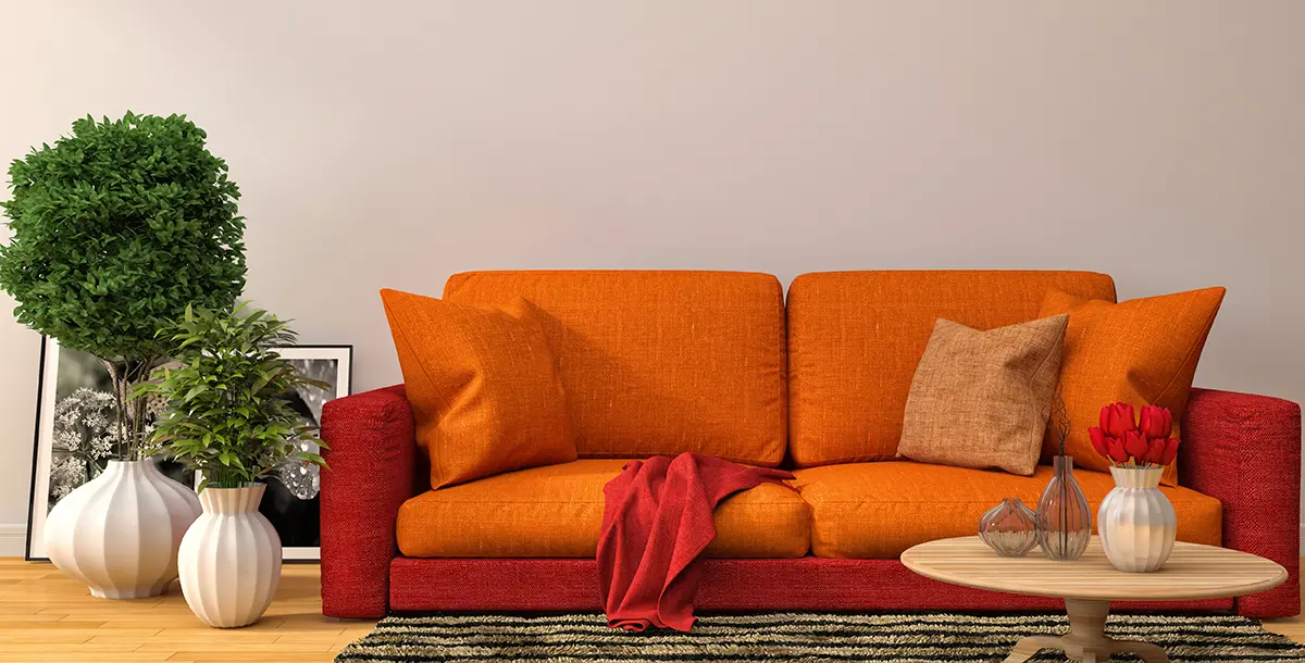 الأريكة البرتقالية.. لمسة جريئة تُضيف إشراقًا لمنزلكِ