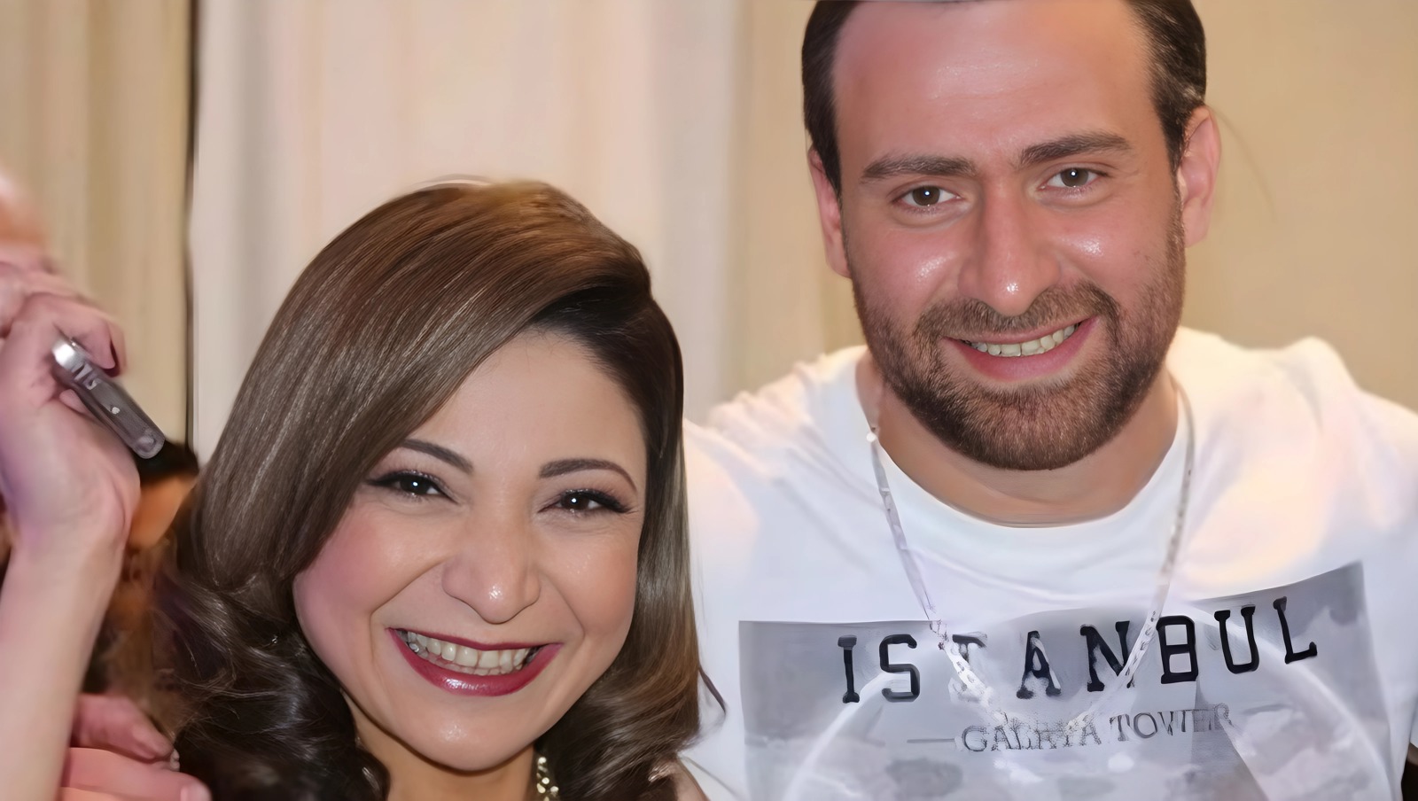 نضال الشافعي وزوجته هند محمد