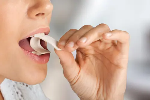 woman chewing bubble gum