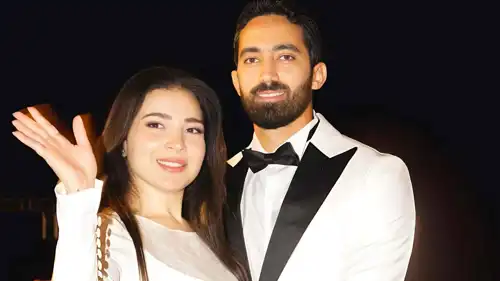 مي عز الدين وزوجها