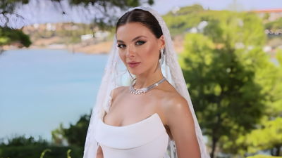 كيف أطلت ملكة جمال لبنان السابقة مايا رعيدي في ليلة زفافها؟