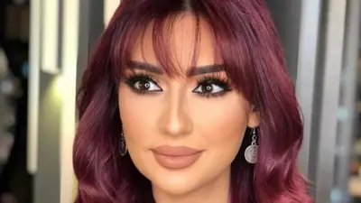 ربى المأمون بالفستان الأبيض مع زوجها وضاح شاهين