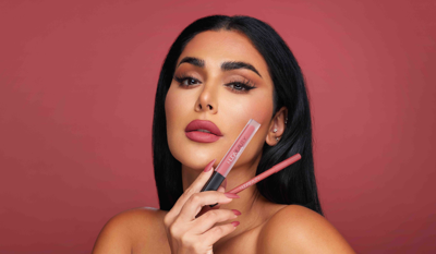 Huda Beauty بينها.. أبرز علامات التجميل الرائدة عالمياً في 2023