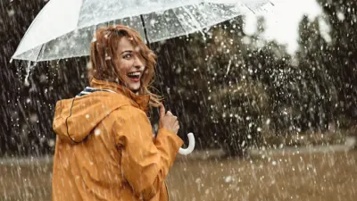 woman walking in rain