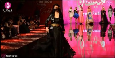 الكمامات حاضرة بعرض أزياء سماح سيف.. للحماية أم إكسسوار للإطلالات؟
