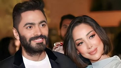 تامر حسني يتفاعل مع غناء طليقته 